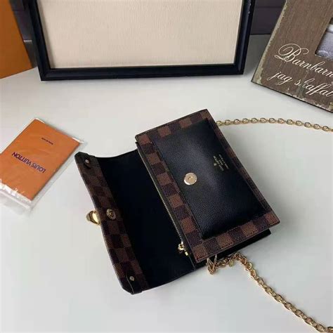 lv wallet on chain singapore|louis vuitton book chain wallet.